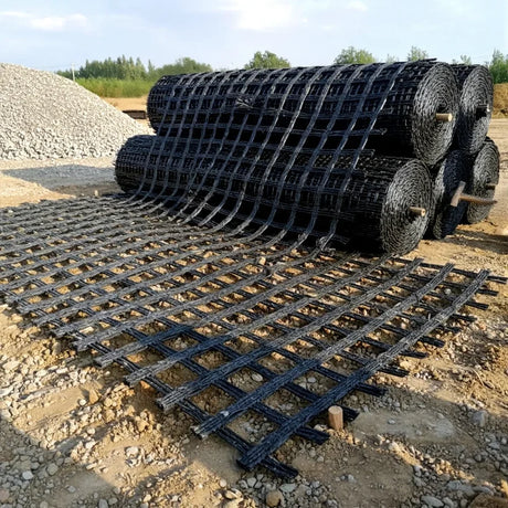 HEIGER PET biaxial geogrid rolls stacked for construction and civil engineering projects
