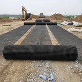 HEIGER PP biaxial geogrid rolled out on a construction site for soil stabilization and reinforcement
